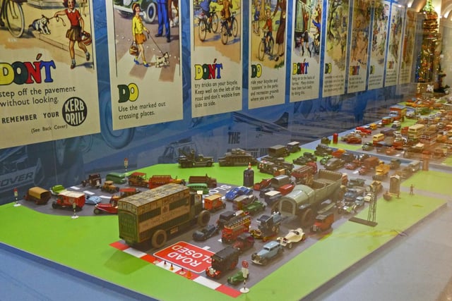 Model cars and posters from all eras are on display at the Motoring in Miniature - On Tour exhibition at the Cascades Shopping Centre.