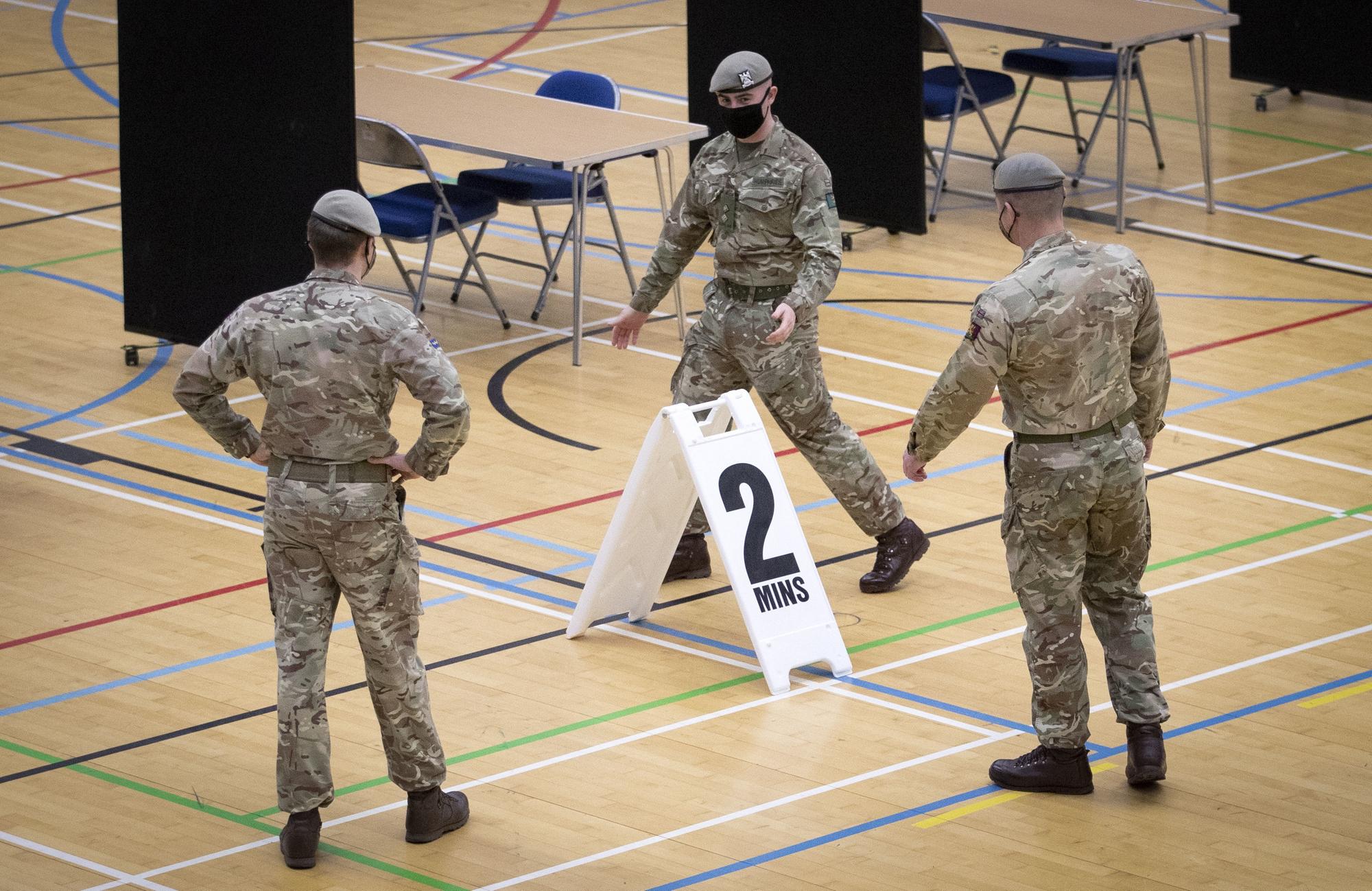 Members of the Royal Scots Dragoon Guard carry out a reconnaissance before setting up a Covidâ€“19 vaccination centre at the Ravenscraig Regional Sports Facility in Motherwell