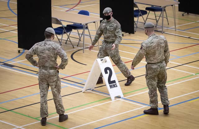 Members of the Royal Scots Dragoon Guard carry out a reconnaissance before setting up a Covid–19 vaccination centre at the Ravenscraig Regional Sports Facility in Motherwell