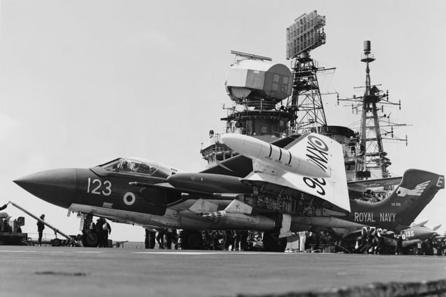 A Fleet Air Arm de Havilland DH 110 Sea Vixen, twin boom, twin-engined two-seat jet fighter of 899 Naval Air Squadron on the flight deck of HMS Eagle during exercises in the English Channel on 3 June 1969.
