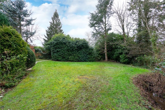 The property sits in just short of half an acre and offers private, enclosed gardens to all sides