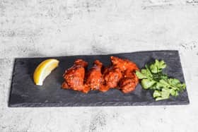Foodies Devour's signature item: Naga naga chicken wings. Picture by Foodies Devour
