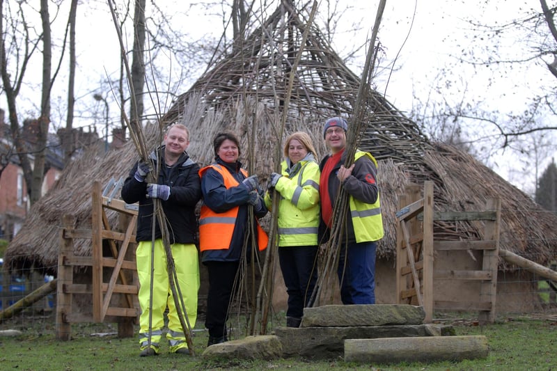 Volunteers who work for Veolia ready to weave some willow on Heeley City Farm, which has a replica Iron Age roundhouse