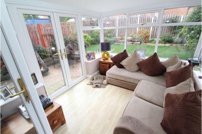 The conservatory looks out onto a well maintained enclosed garden with patio area, raised artificial turf lawn and planted beds. Visit https://www.purplebricks.co.uk/property-for-sale/3-bedroom-detached-house-sheffield-1076382