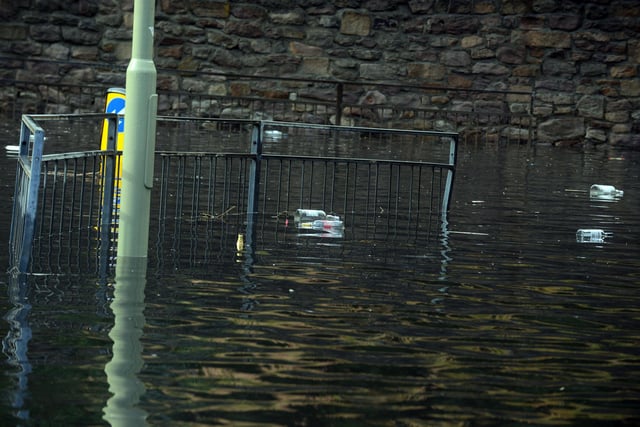 Debris floating in the floodwater at Tyne Dock