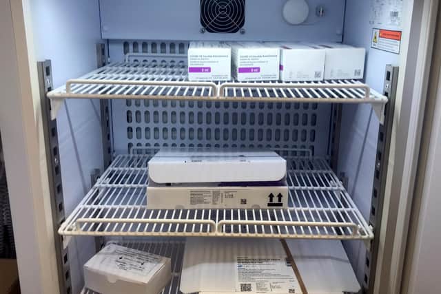 Vaccine fridge with covid vaccines
