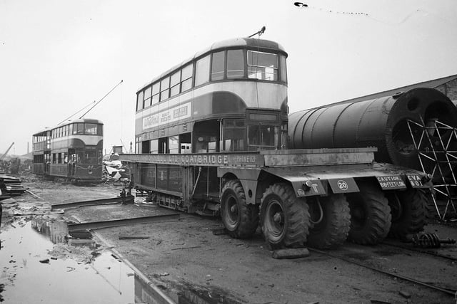 Tram cars being destroyed at Coatbridge - how much would these machines have fetched today we wonder?