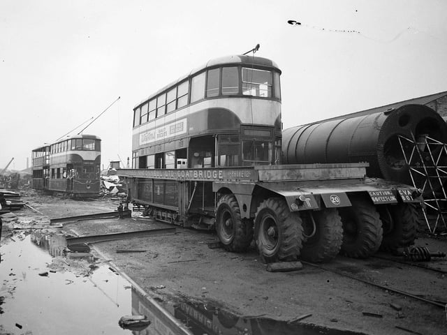Tram cars being destroyed at Coatbridge - how much would these machines have fetched today we wonder?