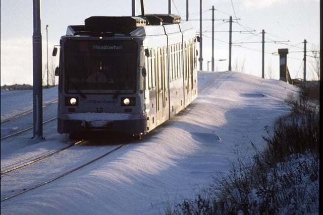Sheffield Supertram in the snow descending Woodbourne Road in 1998