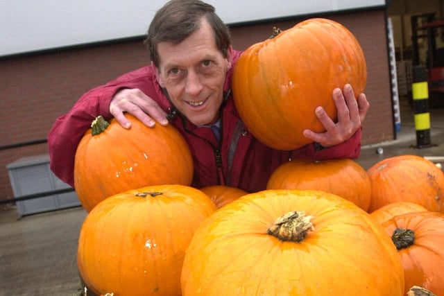 Principal markets officer Andrew Chappell with some of the 300 pumpkins, at the South Yorkshire Fresh Produce and Flower Centre, Sheffield in 2002