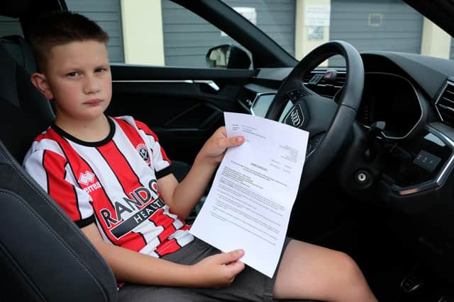Sheffield United fan Harri Parker was just 12 when he was issued with a bus lane fine, after the vehicle in which he was travelling was snapped on the way back from the Blades' play-off semi-final defeat at Nottingham Forest. Photo by Dean Atkins