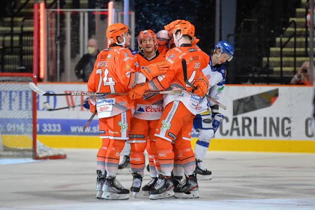 Brandon Whistle, left, joins a Steelers goal celebration entourage. Picture: Dean Woolley