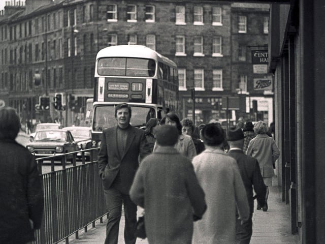 Pedestrians on Earl Grey Street.