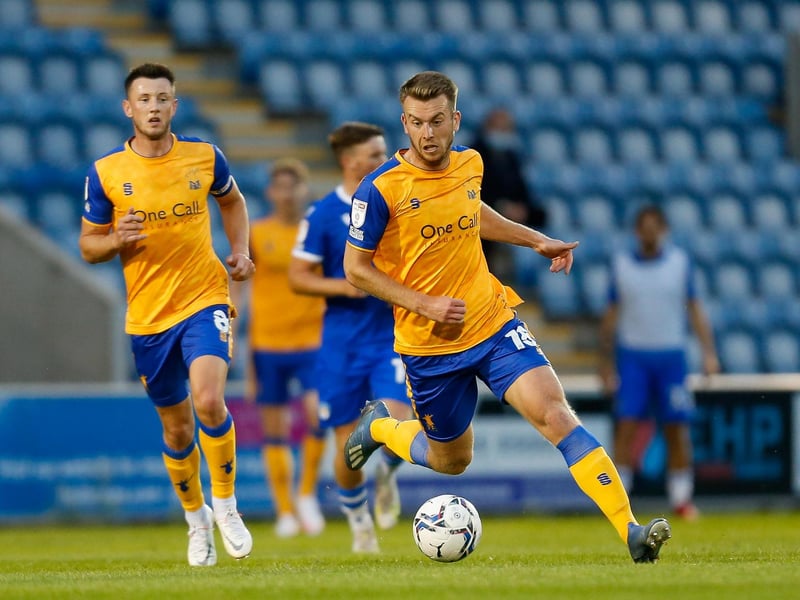 Rhys Oates brings the ball forward.