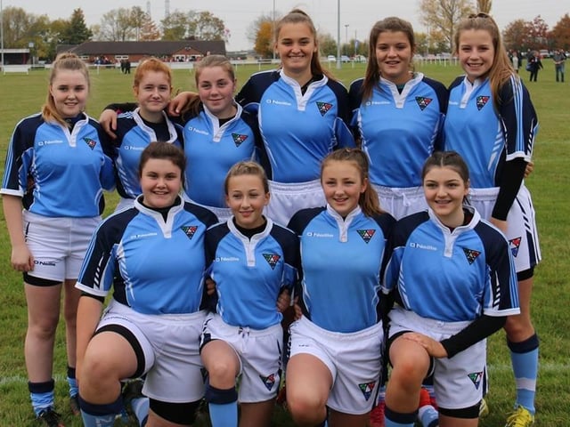 A Mansfield RUFC junior team smile for the camera before their match. Does a young you feature here?