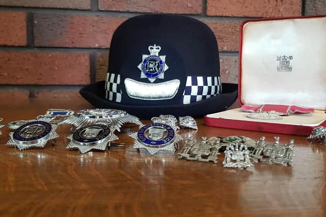 Pictured are the badges and honours attributed to South Yorkshire Police's first female Superintendent Winifred Bishop