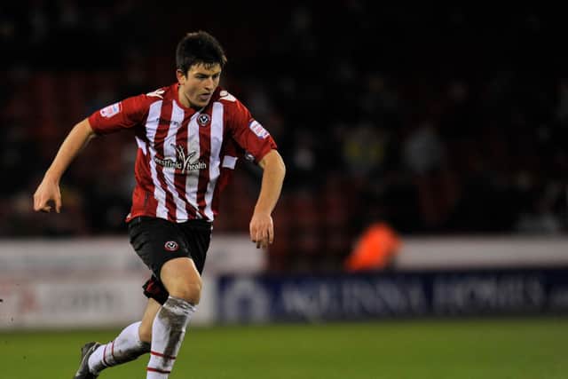 Sheffield United's Harry Maguire in action against Rochdale