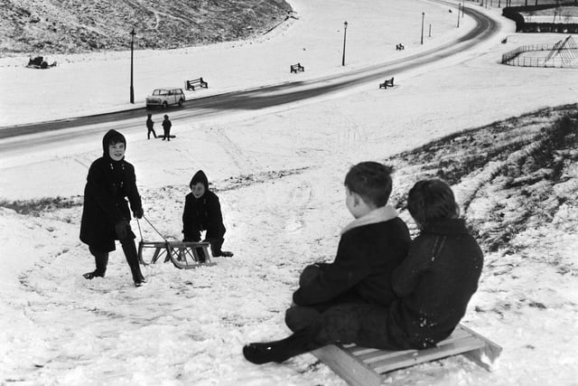 Children sledging in Holyrood Park, Edinburgh, on 28 December, 1965.