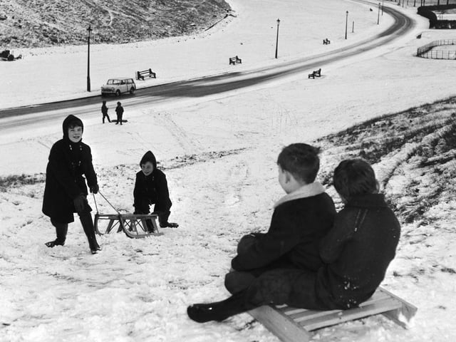 Children sledging in Holyrood Park, Edinburgh, on 28 December, 1965.