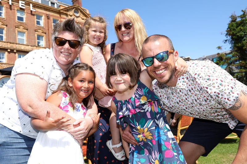 The fun took place in the Queens Hotel garden, the hotel is seen in the background. 
Pictures is Claire Watton-Lawrence, left, and Claire and Dave Turner, and their children.
