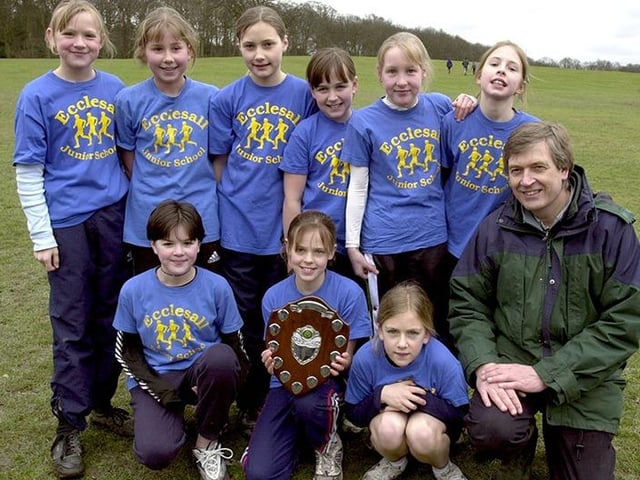 Ecclesall Junior School Y6 girls, winners of the Sheffield Schools Junior Cross Country Championships at Graves Park, Sheffield, with Director of Education, Jonathan Crossley Holland, March 17, 2001
