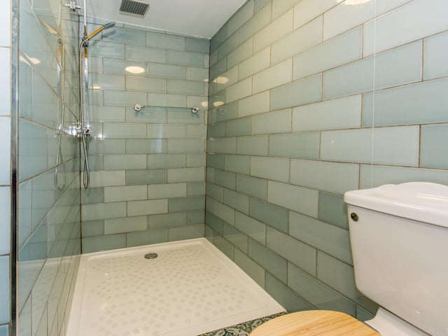 The downstairs bathroom is a great place to shower off after being in the stables.