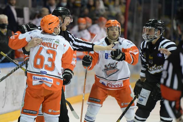 Robert Dowd  and Brendan Connolly in the heat of battle as SHeffield Steelers beat Nottingham Panthers