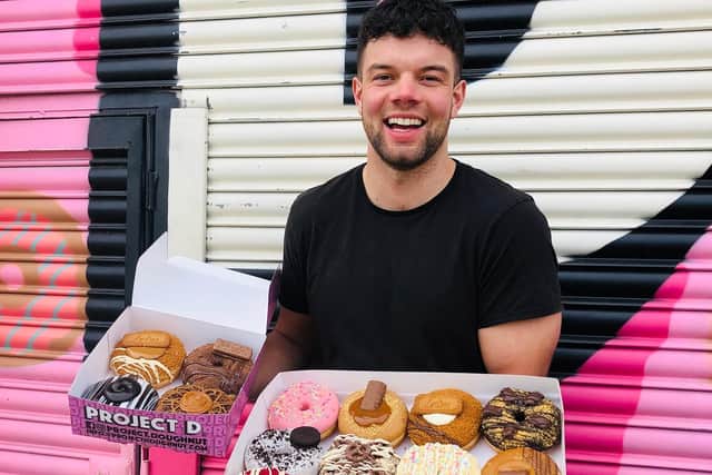 Jacob Watts with Project D doughnuts.