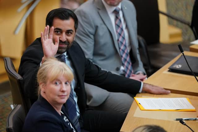 Humza Yousaf sits with deputy first minister Shona Robison. Picture: Andrew Milligan/PA Wire