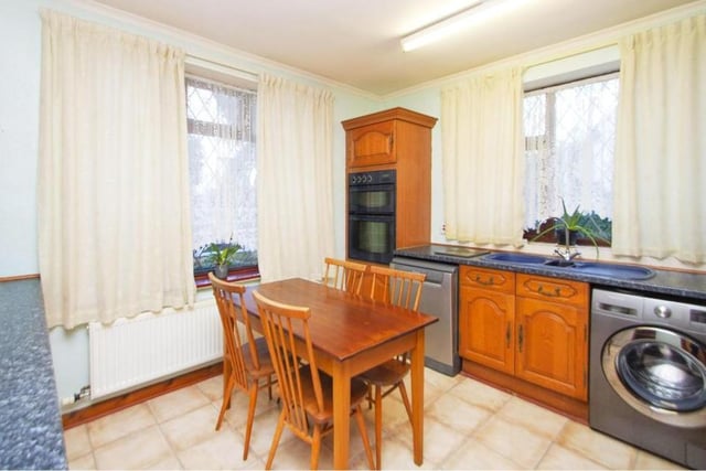 The kitchen has plenty of room for a breakfast table, not to mention an assortment of wall and base units with worktop over, and an inset sink and drainer. There is also a radiator and double-glazed windows to the side and front of the bungalow.