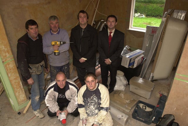 Pictured at on a housing refurbishment on Southey Green, Sheffield,  in 2002 were staff from Sheffield Rebuild Ltd. LtoR back row are,  Steve Fitches Joiner, Mick Exton plumber, Paul Walters Development Manager, and Neil Fieldhouse Managing Director. Frount are Shaun  Dawson Site Forman, and Ryan Windle trainee painter and decorator.