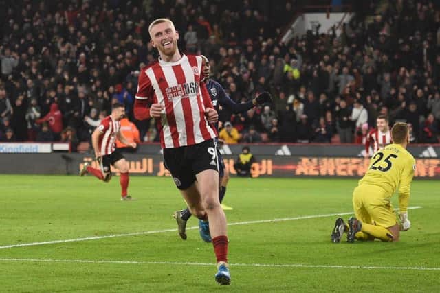 Sheffield United's striker Oliver McBurnie celebrates scoring the opening goal during the English Premier League football match between Sheffield United and West Ham United at Bramall Lane in Sheffield: OLI SCARFF/AFP via Getty Images