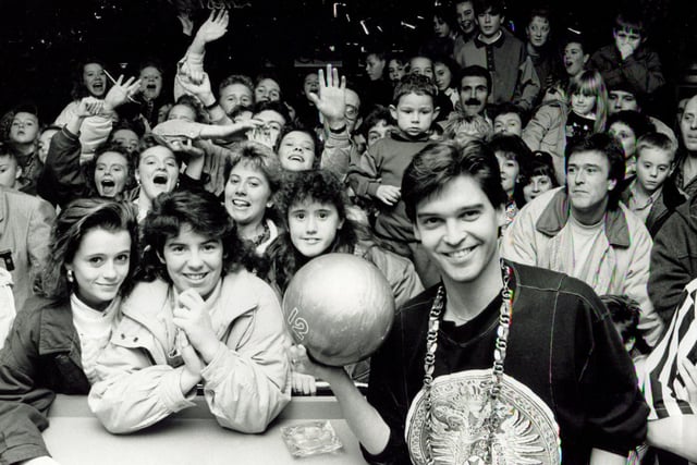 Television presenter Phillip Schofield surrounded by fans at the opening of Sheffield Super Bowl on December 4, 1989