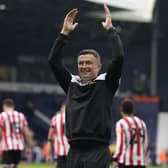 Sheffield United manager Paul Heckingbottom celebrates the win with the fans: Andrew Yates / Sportimage