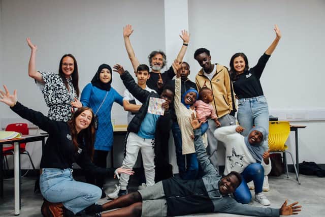 The young people celebrate their new exhibition