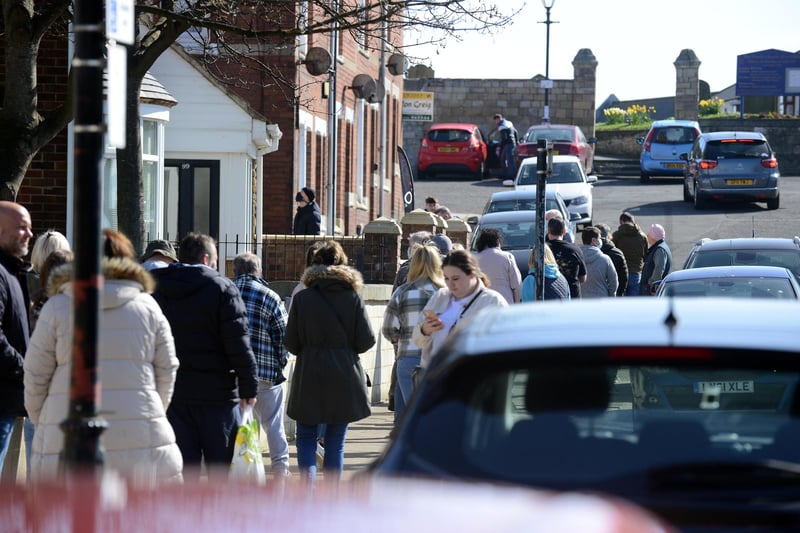 Socially distanced queues outside Verrills fish and chip shop, on the Headland.