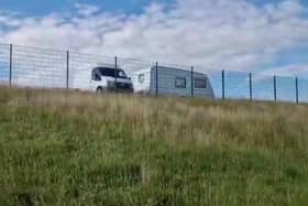 Travellers have now been reported to have left Parson Cross Park, in Sheffield, days after setting up camp. Picture shows a caravan there earlier this week.