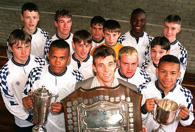 Mr Firth with some of his U16 Hinde House School football team who have won the Sheffield League, Sheffield Cup and the South Yorkshire League, on June 3, 1996