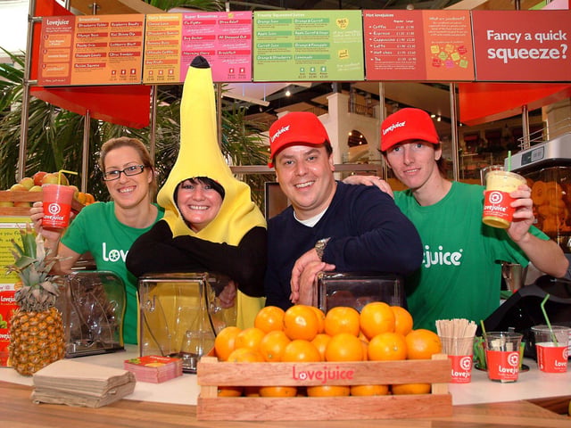 Lovejuice opened in Meadowhall Oasis Food Hall in 2006.  John Heseltine, founder of Lovejuice, cutting a ribbon to officially open his latest store with his two Sheffield staff, Melanie Dydhe manager and Daniel Differ, trainee supervisor.