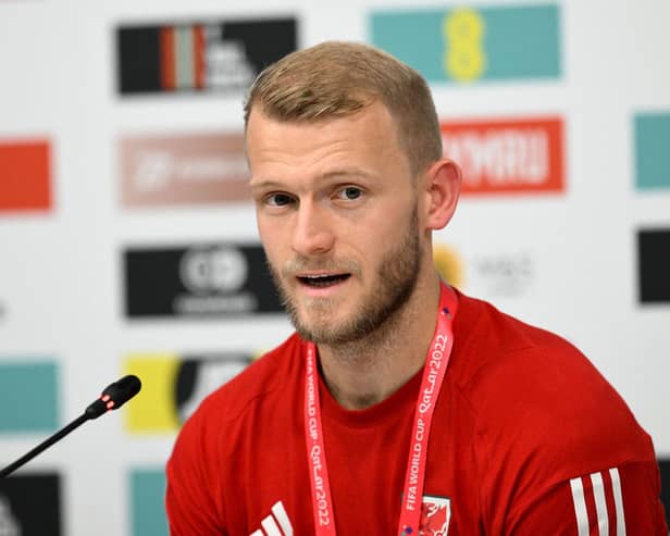 Wales and Sheffield United goalkeeper Adam Davies gives a press conference at the Al Saad SC in Doha: NICOLAS TUCAT/AFP via Getty Images