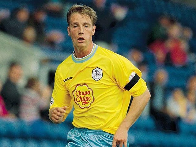 I like this shirt because of it's nod to the early 90s. The yellow and baby blue pops nicely, and the Chupa Chups logo didn't stand out so badly on this one. (Craig Prentis /Allsport)