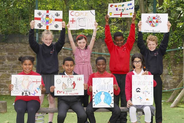 Pupils from Porter Croft School show their support for England in Euro 2020. Back L-R Megan Kelly, Beth Mylon,Muhammad Sulayman and Silas Sutcliffe. Front L-R Ammara Philadelphia, Alazar Yame, Elliot Adriano and Asuda Salih. Picture Scott Merrylees