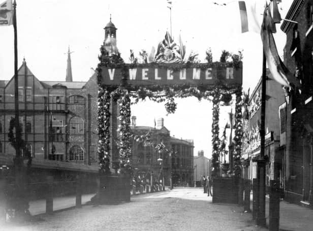 Norfolk Street decorated for Queen Victoria's visit, 1897. Ref no: S01563
