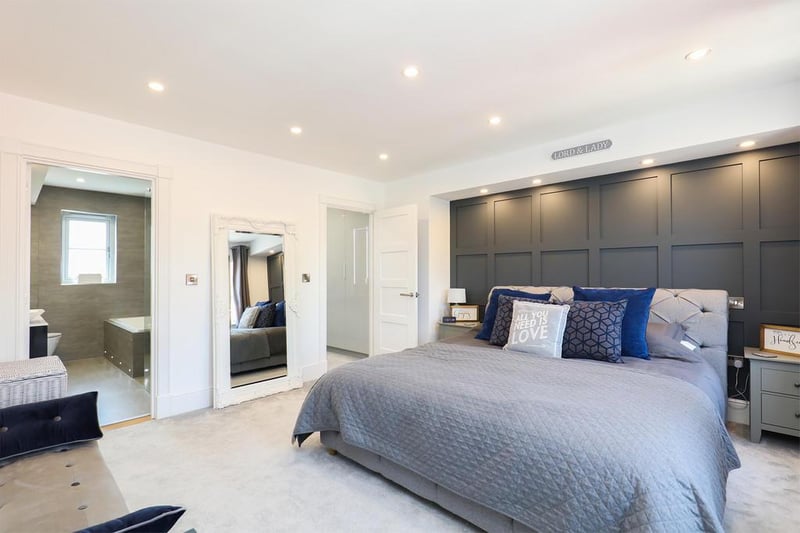 The large first-floor master bedroom boasts a separate dressing room and ensuite bathroom.