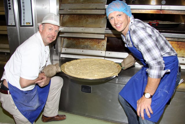 Giant Bakewell Pudding at Jacksons the Bakers. England Rugby Star Matt Dawson(right) and baker Trevor Jackson removed the pudding from the oven in 2010