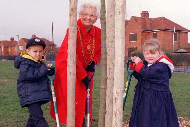 Woodfield Primary pupils Levi Mills, four, and Rebecca Winterburn, three,  joined the Mayor of Doncaster councillor Margaret Robinson in a millennium tree plant at the Balby School in 2000