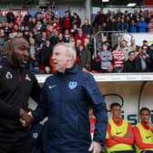 Darren Moore shakes hands with Portsmouth boss Kenny Jackett