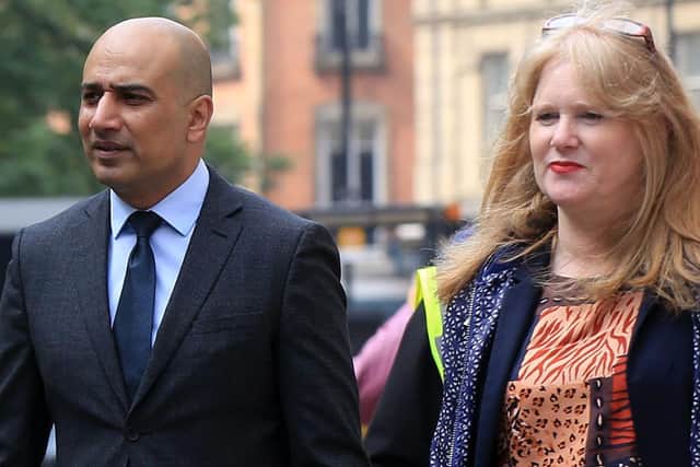 Coun Mazher Iqbal and Diane Jarvis, manager of the Sheffield BID, on Fargate. Picture: Chris Etchells.