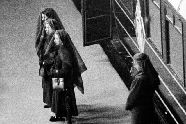 The Queen, the Queen Mother and Princess Margaret seen at King's Cross Station after the cortege had left for its processional journey to Westminster Hall.  They left by car to await the arrival of the coffin at Westminster, February 11, 1952