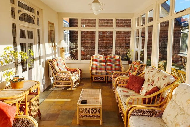 The sun room. Bourne End House also boasts a private, traditional themed pub on site for the exclusive use of guests.